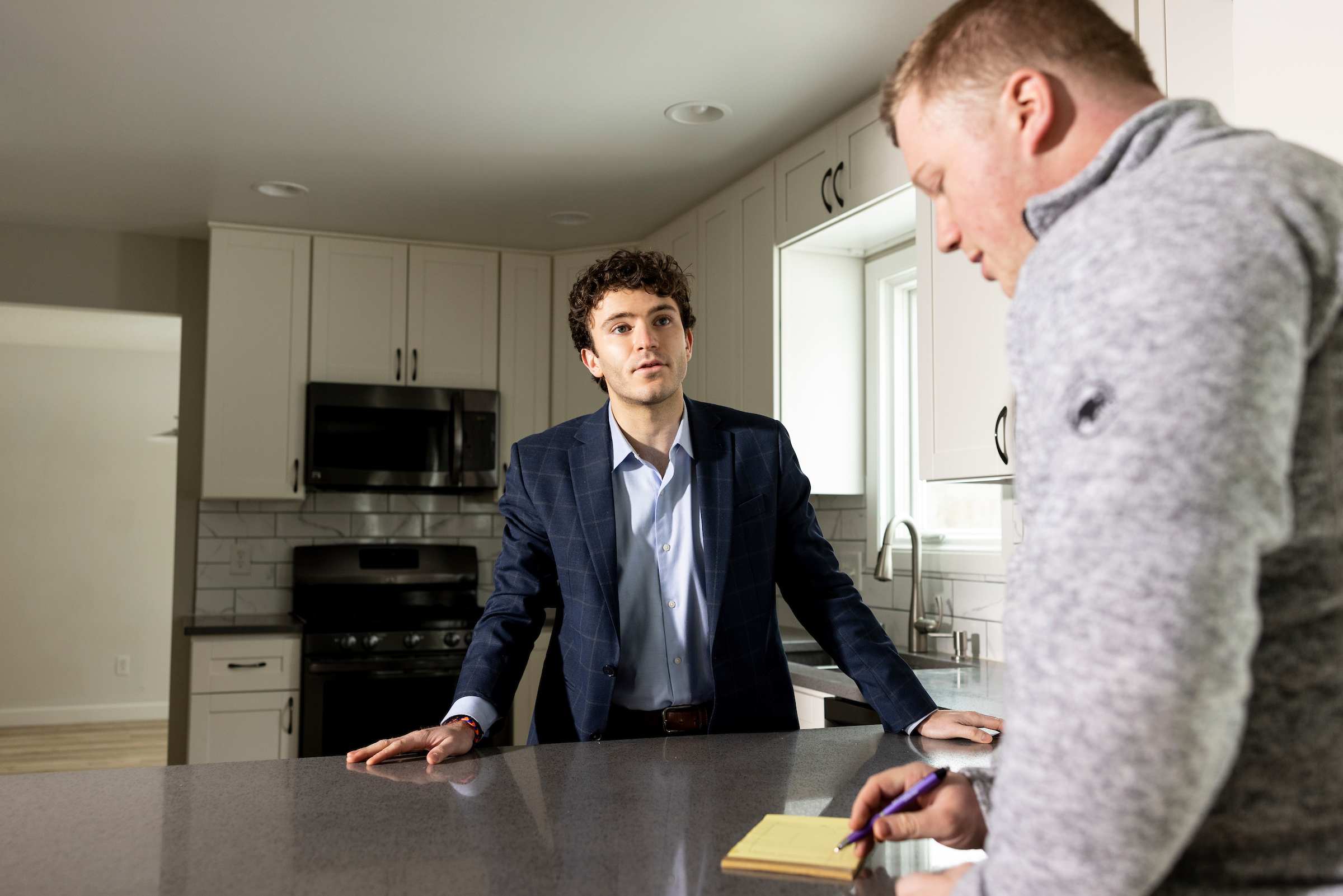 30264451A (02/21/22) - REA - Isaac Teplinsky, a realtor with Coldwell Banker Realty, shows a house to Grant Chelstrom in Maple Grove, Minn., on Monday, February 21, 2022. 

(Jenn Ackerman for The New York Times) 
@ackermangruber